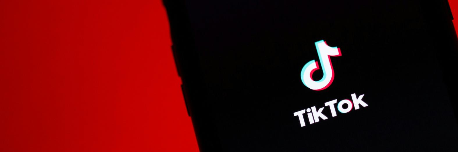 TikTok app in front of Chinese flag