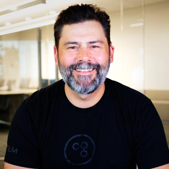 man in black shirt with a beard