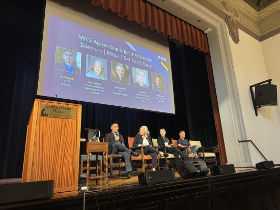 photo of four people on a panel