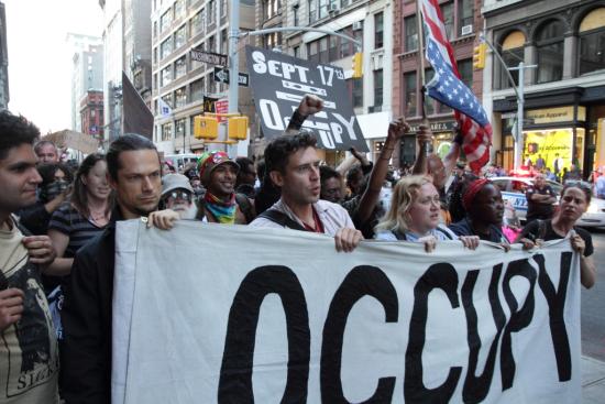 Occupy Wall Street <br />(photo by <a href="http://flic.kr/p/db5eN3">Paul Stein</a>)