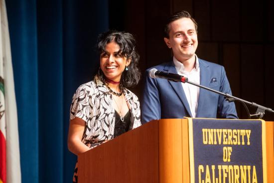 Meena and Information Management Student Association (IMSA) co-president Daniel Rincon presented student awards at graduation in May 2019. (Photo by Noah Berger)